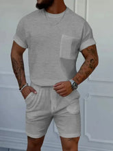 Men’s full size round neck short sleeve top and shorts set in light gray textured fabric with chest pocket and rolled sleeves