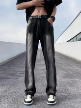 Men’s full size straight leg black denim jeans with gray leather side panels and silver toned belt buckle