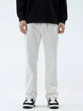 Men’s full size straight leg jeans in white cotton fabric with a clean minimalist design and straight-leg fit