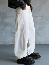 Men’s full size textured wide-leg pants in white with subtle pattern and reinforced stitching for durability