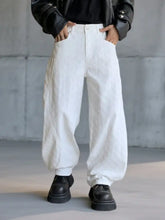 White textured wide-leg denim pants for men with a relaxed fit and subtle embroidered detailing in plus size