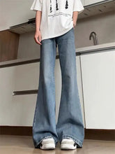 Men’s full size vintage flare leg jeans in light-wash denim with a relaxed wide-leg cut for comfort and style