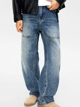 Men’s full size vintage wash relaxed fit blue denim jeans with wide-leg cut and subtle fading for casual wear