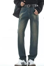 Men’s full size vintage wash straight leg jeans in dark-wash denim with faded distressed look and classic five-pocket design