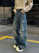 Men’s blue vintage wash cargo jeans with wide-leg fit and multiple large pockets in relaxed plus size style