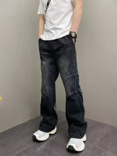Men’s dark-wash denim wide-leg jeans with vintage wash, relaxed fit, reinforced stitching, and flap cargo pockets
