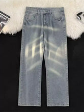 Men’s full size vintage wash wide leg jeans in light-wash denim with straight-leg cut and subtle faded distressing
