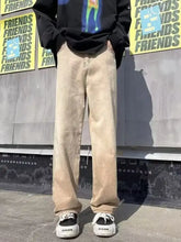 Men’s full size vintage wash wide leg beige denim jeans with relaxed fit and cuffed hems in plus size