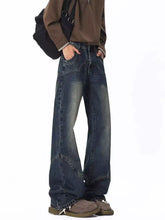 Men’s full size dark-wash denim jeans with vintage wash wide leg flared silhouette and visible stitching details