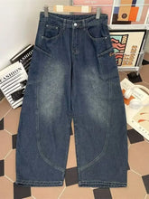 Men’s full size vintage wash dark-wash denim wide leg jeans with large patch pockets and relaxed tapered fit