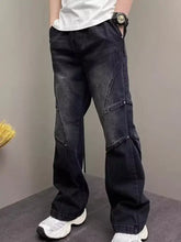 Men’s full size vintage wash wide leg jeans in dark wash denim with reinforced stitching and patchwork design details