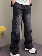 Men’s full size vintage wash wide-leg jeans in dark-wash denim with reinforced stitching and multiple pockets