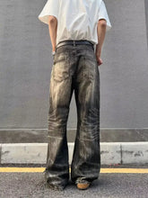 Men’s full size vintage wash wide-leg jeans in dark wash denim with faded and distressed texture plus size fit