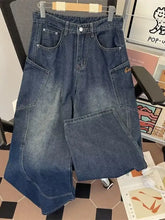 Men’s dark blue vintage wash jeans with high waist wide-leg cut and large patch pockets in full size vintage wash