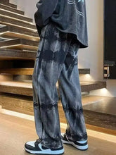 Men’s dark gray tie-dye denim wide leg jeans with a relaxed fit in full size vintage wash plus size collection