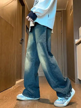 Men’s wide leg jeans in vintage wash denim with faded blue color and subtle distressing details plus size full size