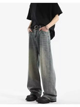 Men’s full size vintage wash wide leg jeans in faded gray denim with subtle distressing and a relaxed fit