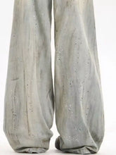 Men’s gray vintage wash wide leg trousers with subtle speckled texture and soft flowing fabric full size plus size