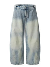 Men’s full size vintage wash wide leg jeans with high-waisted faded gradient denim and subtle distressing details