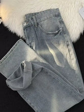 Mens full size vintage wash wide leg light-wash denim jeans with faded distressed look and classic five-pocket design