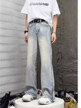 Men’s light-wash vintage wash denim wide leg jeans with flared leg and front zipper detail full size plus size