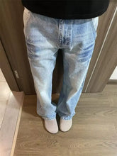 Men’s light-wash denim wide leg jeans with vintage wash and faded distressing plus size relaxed fit