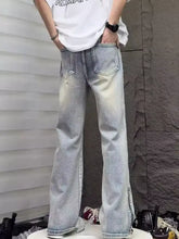 Men’s full size vintage wash light-wash denim wide leg jeans with flared leg and side zipper detail