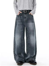 Men’s full size vintage wash wide-leg jeans in faded dark blue denim with subtle distressing and simple care features