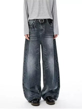Men’s full size vintage wash wide-leg jeans in faded dark blue denim with visible stitching and reinforced patch pockets