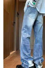 Men’s full size vintage wash light-wash denim wide leg jeans with relaxed straight-leg cut and frayed cuffs