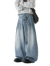 Men’s light-wash denim wide-leg jeans with a relaxed high-rise fit and visible stitching in a wash belted design
