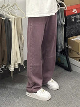 Men’s full size wash loose fit jeans in purple with wide-leg relaxed fit and subtle vertical stitching details