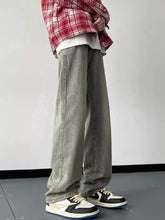 Men’s full size wash loose fit jeans in gray green denim with classic stitching and natural wash loose fit design