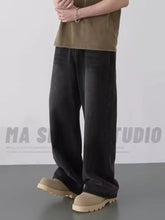 Black wide-leg denim pants featuring a relaxed straight-cut silhouette in men’s full size loose fit jeans