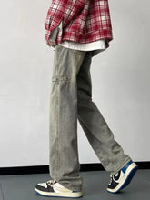 Men’s washed gray denim cargo loose fit jeans with relaxed fit and visible side pockets in full plus size