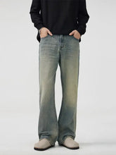 Men’s light-wash denim bootcut jeans with a faded distressed look wide leg full size wash wide plus size