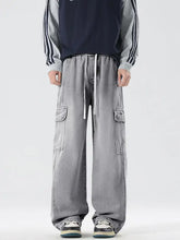 Men’s gray washed denim wide leg cargo jeans with drawstring waist and two large side pockets plus size cargo jeans