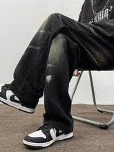 Men’s full size wash wide-leg jeans plus size black distressed denim with relaxed fit and subtle fading