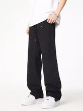 Men’s full size wash wide leg jeans in black with subtle silver button accents and plus size fit