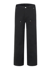 Men’s full size wash wide leg jeans in black featuring subtle silver button accents on front and pockets