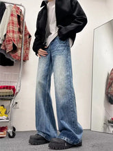 Men’s full size wash wide-leg jeans in blue denim with relaxed fit slight fade slight distressing and care instructions