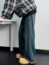 Dark blue denim men’s full size wash wide leg jeans with a relaxed straight leg cut in plus size