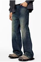 Men’s full size wash wide leg jeans plus size in dark-wash denim with a faded, distressed look and visible stitching
