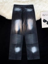Men’s full size wash wide dark wash denim jeans with faded distressed look and horizontal striped detailing on thighs