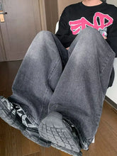 Dark gray wide leg denim jeans for men with a relaxed, straight-cut silhouette in plus full size wash