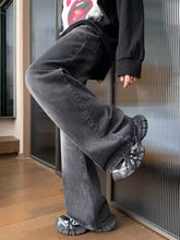 Men’s full size wash wide leg jeans in dark gray denim with a relaxed fit and subtle fading detail