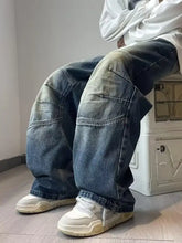 Men’s dark-wash denim wide-leg jeans with reinforced patches offering a perfect fit in plus size