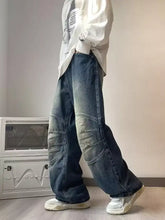 Men’s full size wash wide leg jeans in faded blue denim with reinforced patchwork detailing for a perfect fit