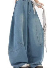 Men’s light-wash denim wide leg jeans with relaxed fit and subtle distressing in plus size full wash wide-leg jeans