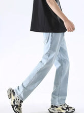 Men’s full size wash wide leg jeans in light-wash premium cotton with a perfect fit and classic straight-leg design